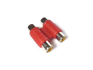 Close up of red audio connector isolated on white background. Audio equipment.