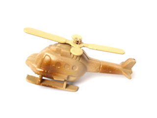 Close up of brown helicopter toy isolated on white background. Kids toy. Plastic toy.