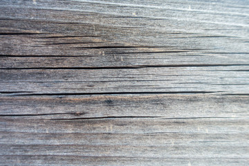 A dark background of a wooden pallet
