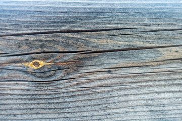 A dark background of a wooden pallet