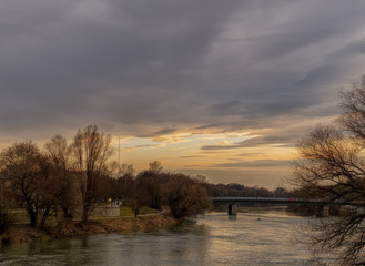  evening at sunset, river view in the city