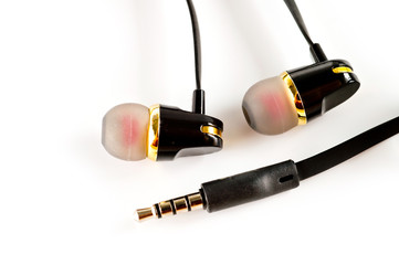 Vacuum headphones in black with a headset, shot on a white background. Background for music and...