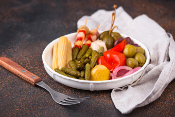 Assortment of marinated or pickled vegetable.