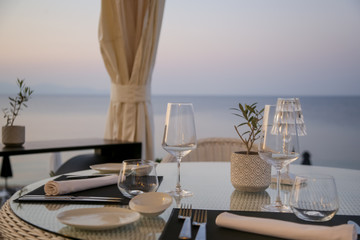 Restaurant table setting with sea view