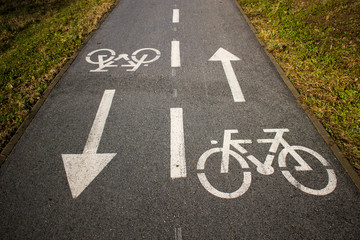 Bicycle track, two-way cycling lanes, painted bicycle symbol on asphalt