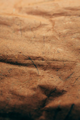Close up view of abstract brown texture and background made with recycled paper. 
