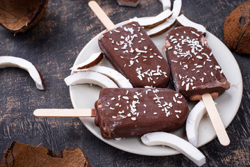 Coconut popsicles in chocolate glaze
