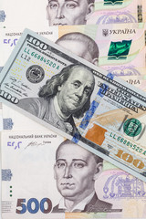 Ukrainian money - hryvnia banknotes USA dollars bills. Finance in Ukraine, of the hryvnia to the dollar exchange rate. Close-up concept finance investment.