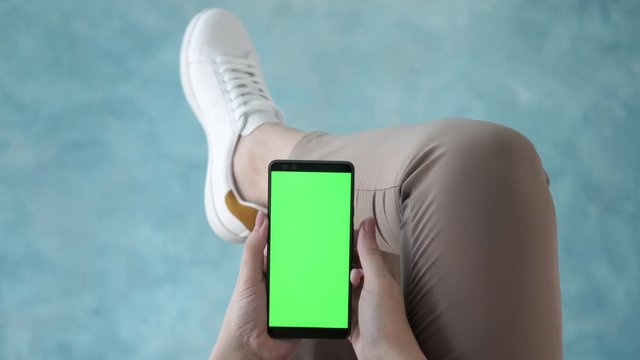 Colour mockup touch screen for web store browsing and online shopping closeup. Casual relax life of busy lying person tracking app and reading news using cell phone pov. Scroll up, right, center click