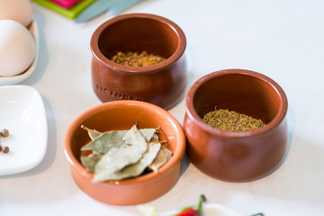 Top view, kitchen table lifestyle with different spices