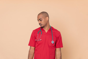 African doctor with red uniform