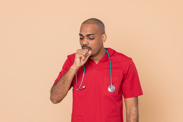African doctor wearing a red uniform