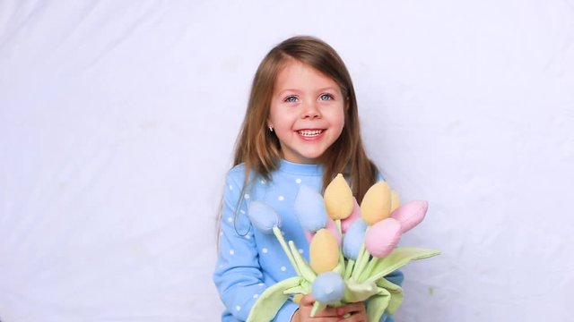Cute little girl with flowers