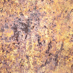 Vintage background of rusty metal sheet with exfoliated yellow paint, seamless pattern