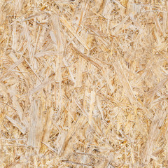 Wooden background from OSB plate close-up. seamless pattern