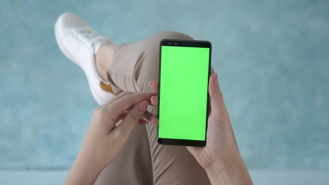Chromakey mockup for watching app content and online shopping surfing closeup. Modern life of relax hipster using touchscreen cellphone web tracking smart business pov. Scroll up, right, click center