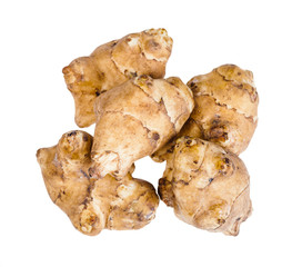 pile from raw tubers of jerusalem artichoke