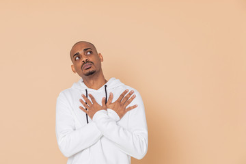 African guy with a white sweatshirt