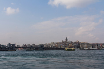 Fototapeta na wymiar View of the Bosphorus and Istanbul's Karakoy district on a sunny day. Turkey