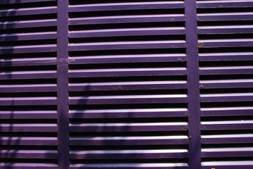 Yellow, purple and black stripes come from the car box. line window wallpaper can be used for background, desktop, design, and others