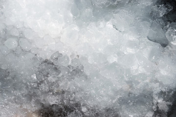 Winter background of frozen water