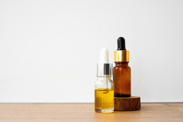 Brown bottle with dropper on white background. Essential oils or essence. 