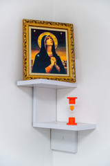 Hourglass altar in a white corner