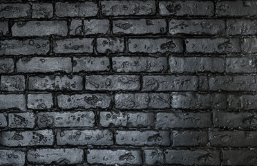 gloomy background, black brick wall of dark stone texture