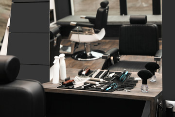 Hairdresser tools on table in barber shop