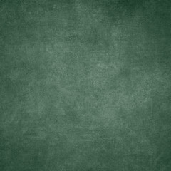 Green designed grunge texture. Vintage background with space for text or image