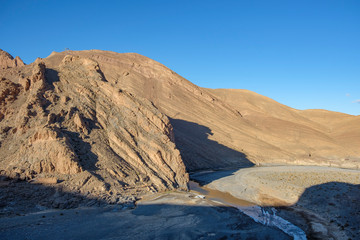 The river Ziz flows through the Atlas Mountains