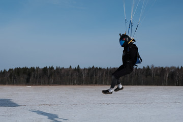 Skydiving. Parachute piloting and landing.