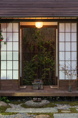Traditional Japanese house with backyard flower garden. Oriental background