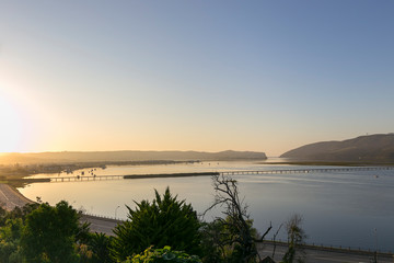 morning over lagoon water sunrise knysna heads south africa