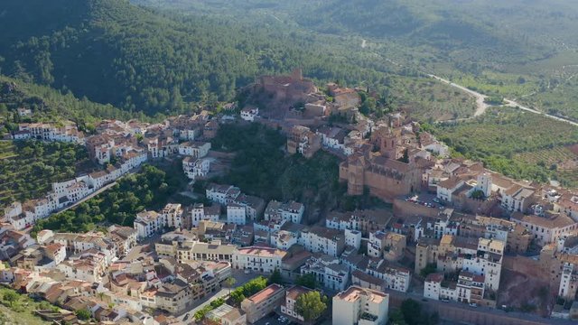Vilafames (or Villafames) is built in mountain slopes. On hilltop there is an spanish red castle with a Asunción church that dominates the landscape. Province of Castellon, Valencia, Spain