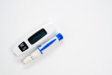 A system for measuring blood glucose. Blood glucose meter Background for healthcare.