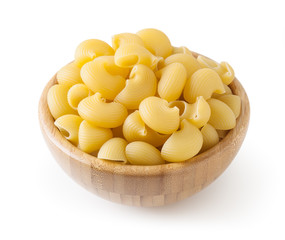 Uncooked pipe rigate pasta in wooden bowl isolated on white background with clipping path