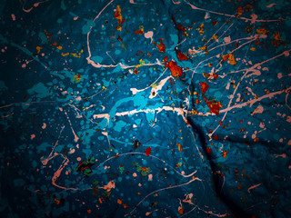 Blue texture with splashes of paint