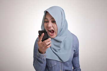 Young Woman Angry by Phone Call, Screaming on Phone