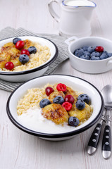 Wheat porridge with fruit and berries