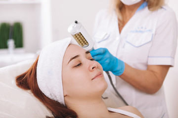 woman receives a spa treatment