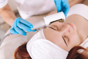 woman receives a spa treatment