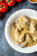 liver cream stew, creamy sauce (chicken liver, healthy diet eating) keto or paleo diet menu concept background. top view. copy space for text