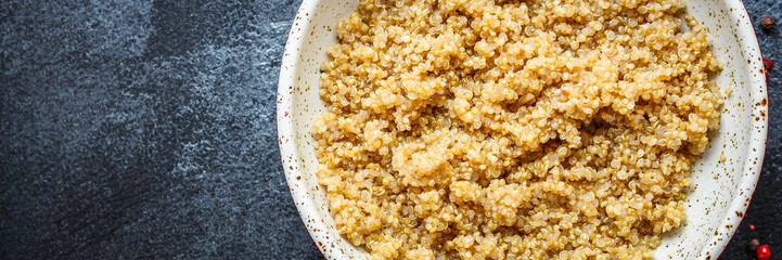 Cooked quinoa, boiled cereal porridge (healthy diet eating) menu concept background. top view. copy space for text