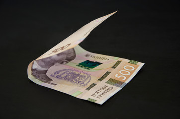500 hryvnia on a black background.