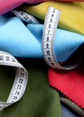 measure tape on fabric background