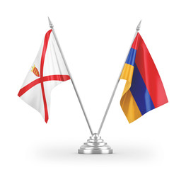 Armenia and Jersey table flags isolated on white 3D rendering