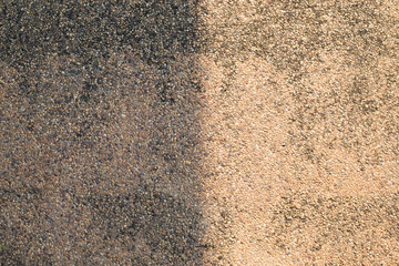 Concrete floor background, Old and stained, Divided by shadow of the house roof.