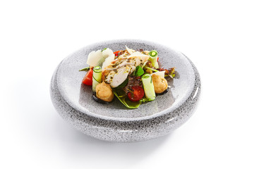 Salad with cheese profiteroles and sous vide chicken