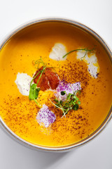 Pumpkin soup in bowl